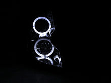 Load image into Gallery viewer, Anzo USA 121416 Projector Headlight Set w/Halo Fits 03-07 CTS