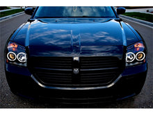 Load image into Gallery viewer, Spyder Auto 5009852 CCFL LED Projector Headlights Fits 05-07 Magnum