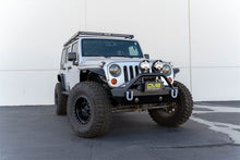 Load image into Gallery viewer, DV8 Offroad LPBM-02 Fairlead Mounted Flip-Up License Plate Bracket