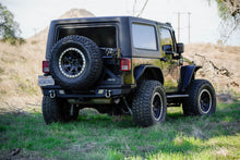 Load image into Gallery viewer, DV8 Offroad TCJK-13 Tire Carrier Fits 07-18 Wrangler (JK)
