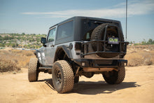 Load image into Gallery viewer, DV8 Offroad TCJK-14 Body Mounted Tire Carrier Fits 07-18 Wrangler (JK)