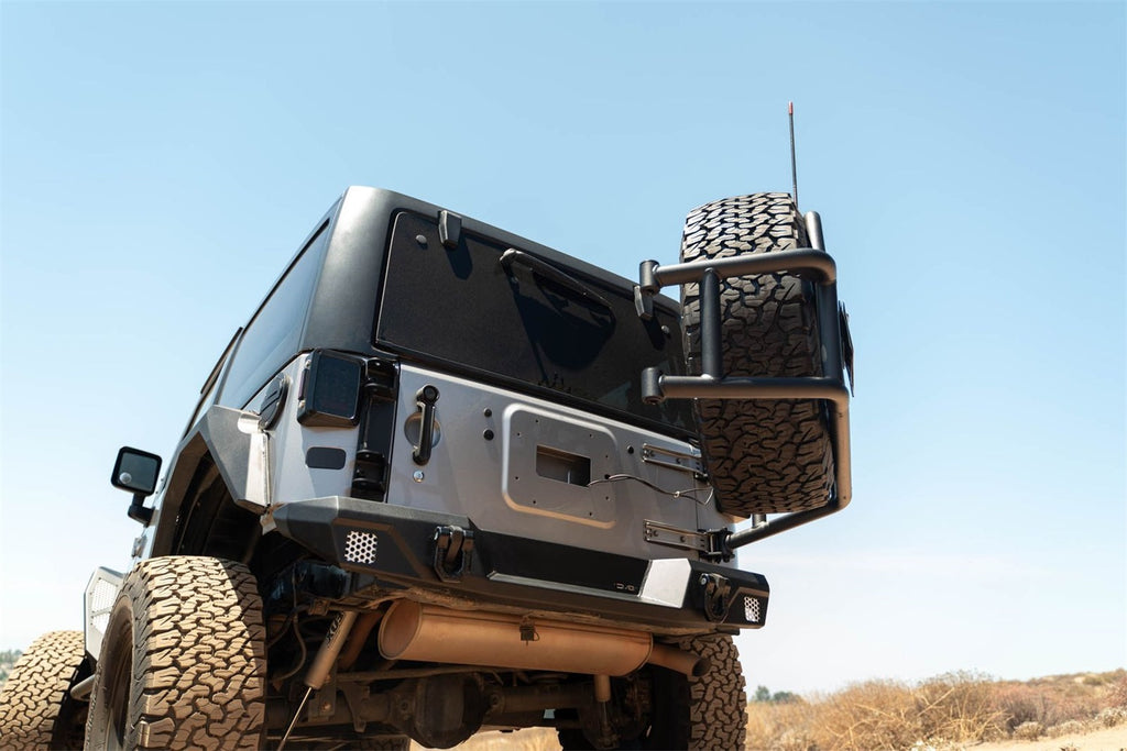 DV8 Offroad TCJK-14 Body Mounted Tire Carrier Fits 07-18 Wrangler (JK)
