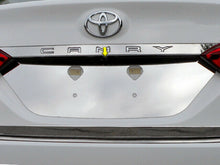 Load image into Gallery viewer, QAA LP18130 Polished License Plate Bezel 1Pc Fits 18-23 Camry Sedan