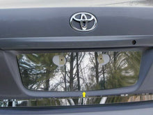 Load image into Gallery viewer, LP29112 Polished License Plate Bezel 1Pc Fits 09-13 Corolla Sedan