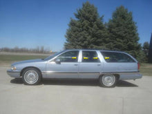 Load image into Gallery viewer, QAA Polished Pillar Post Trim 8Pc Fits 92-97 Roadmaster Wagon