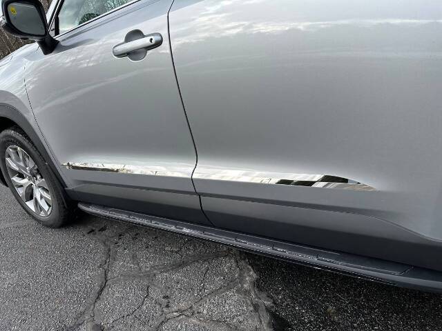 QAA Polished Rocker Panel Trim 4Pc Fits 24-26 Grand Highlander
