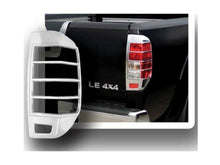 Load image into Gallery viewer, QAA TL25510 Chrome Tail Light Bezels 2Pc Fits 05-21 Frontier