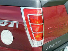 Load image into Gallery viewer, QAA TL42185 Chrome Tail Light Bezels 2Pc Fits 02-06 Avalanche