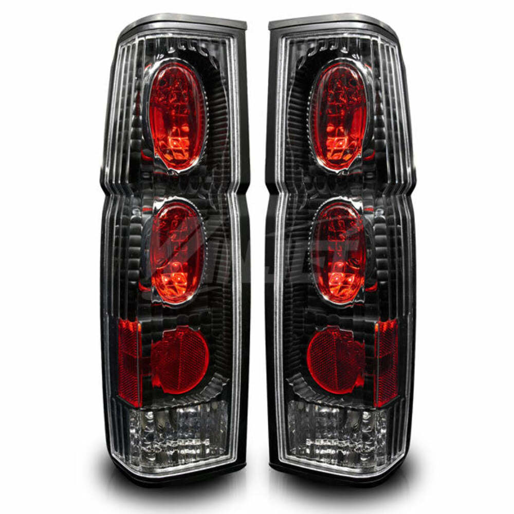 Winjet CTWJ-0041-BC Taillights Black Clear Lens Fits 86-97 Hardbody