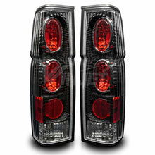 Load image into Gallery viewer, Winjet CTWJ-0041-BC Taillights Black Clear Lens Fits 86-97 Hardbody