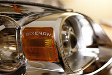 Load image into Gallery viewer, Morimoto A180 1x Die Cut Chromed Metal inBiXenonin Emblem